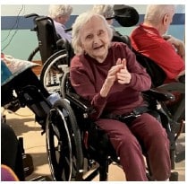 lady in wheelchair clapping